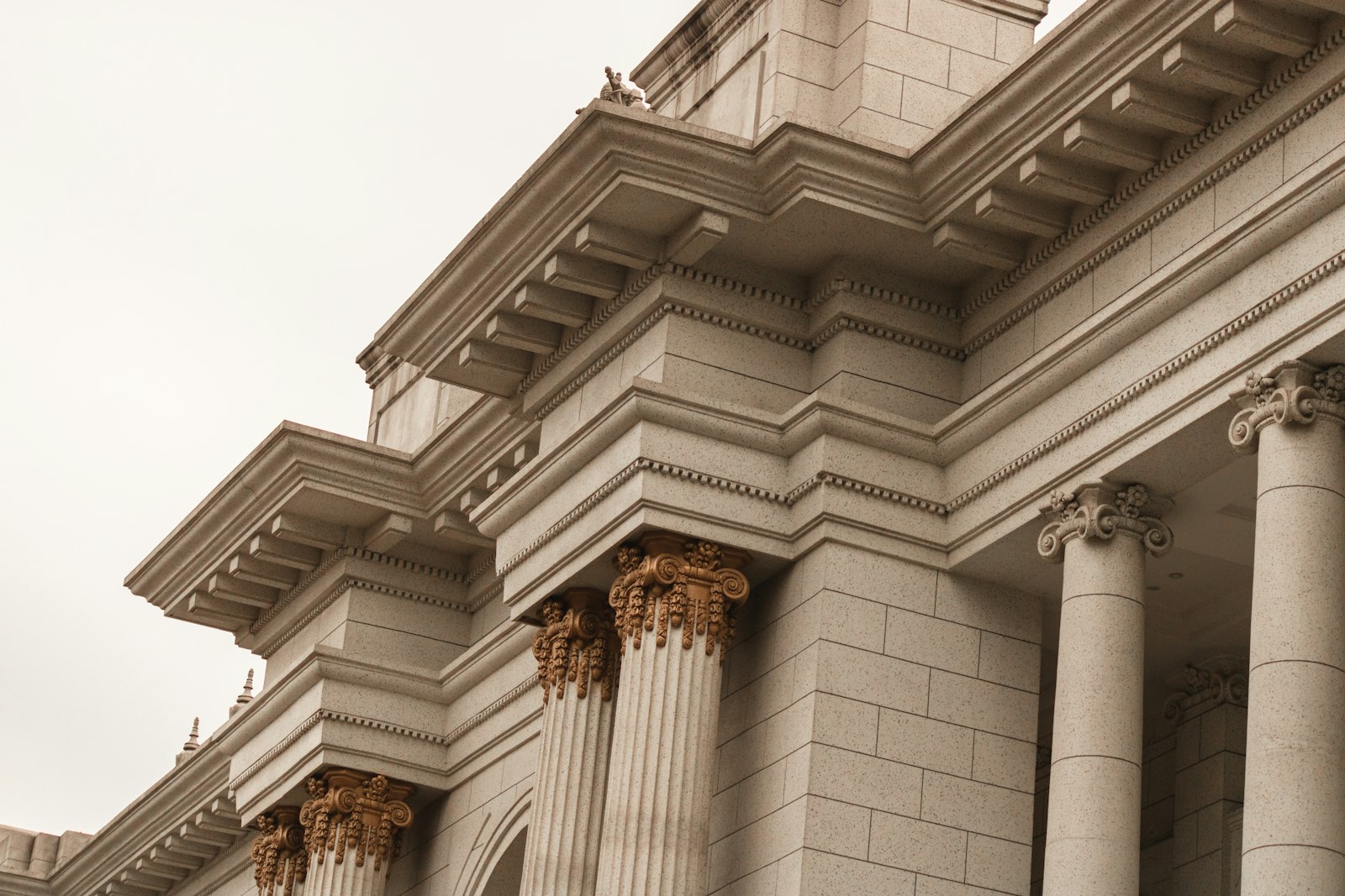 Classical architecture with ornate columns and detailed cornices